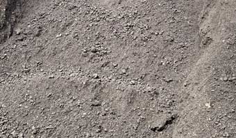 A close up of 3 way top soil.