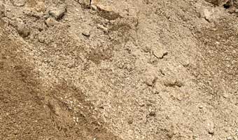 A close up of bedding sand.